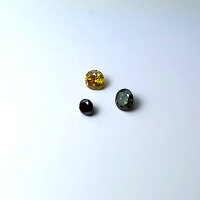 3 fancy Diamonds black yellow green round cut approx. 0.3...