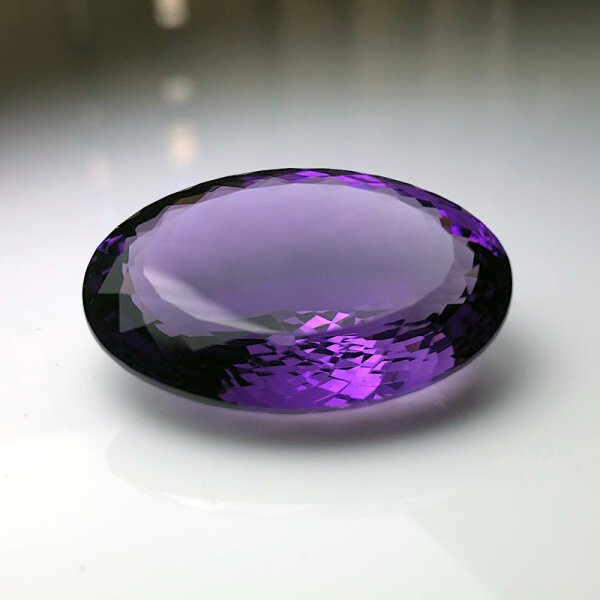 Amethyst dark violet oval cut 65.4 Carats 33.9x23.7mm untreated natural